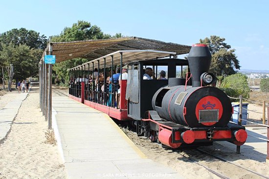 Praia do Barril in Algarve white sandy beach and gentle sea reached by train