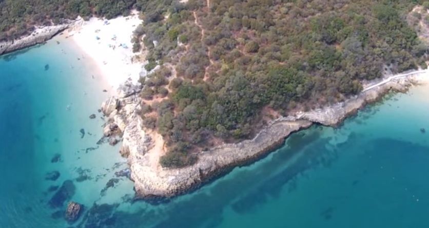 Is considered the most beautiful wild beach of Portugal a paradise of crystal clear waters